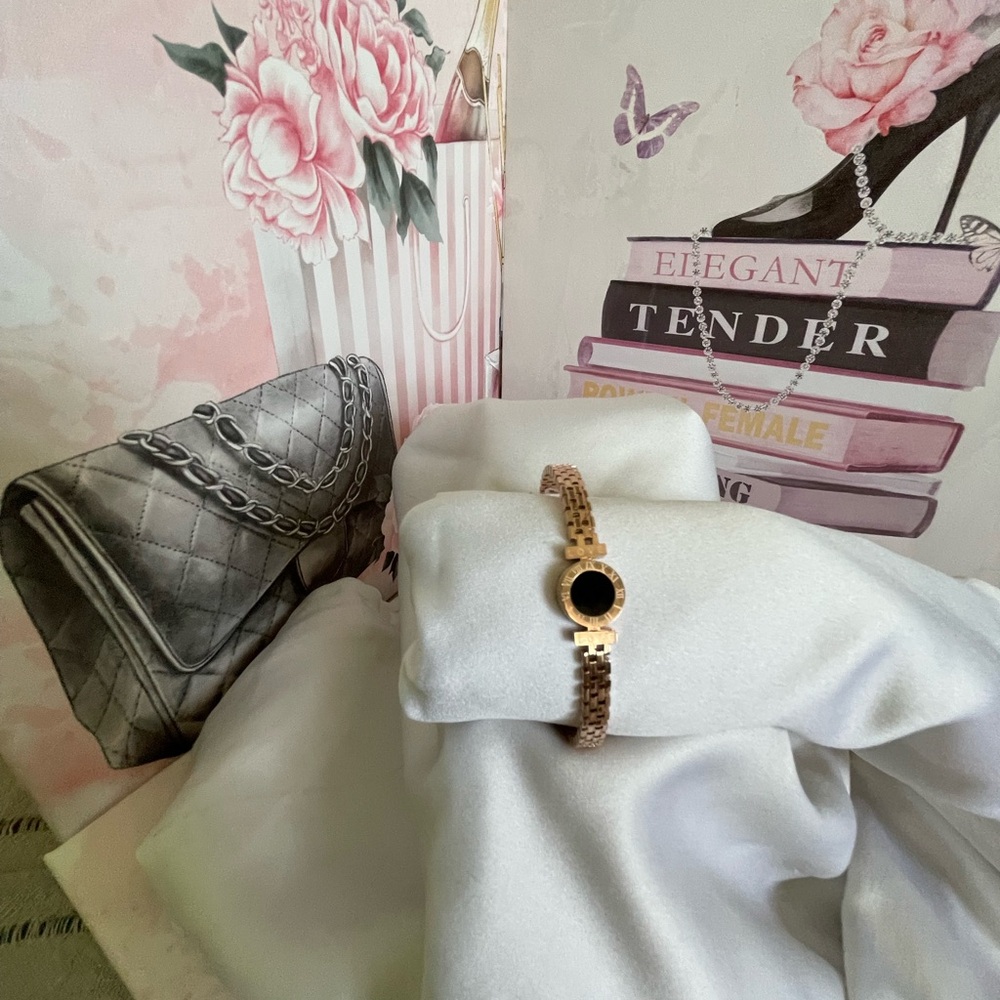 A beautiful and sparkling  bracelet with around black stone.